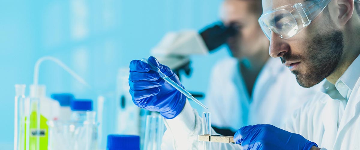 A chemist working in a laboratory.